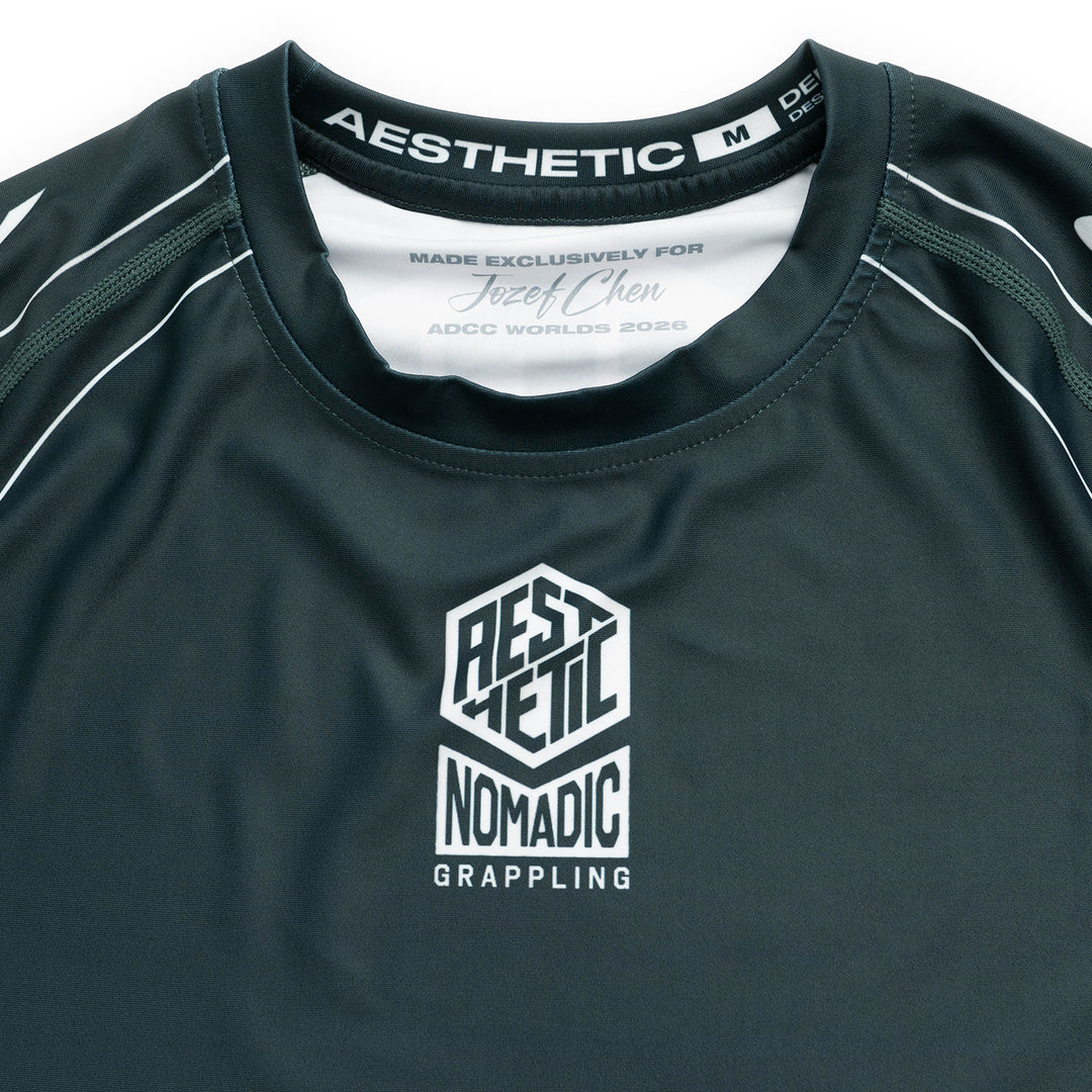 AESTHETIC Petrol Blue ADCC 2026 Jozef Chen Short Sleeve Rashguard - top view