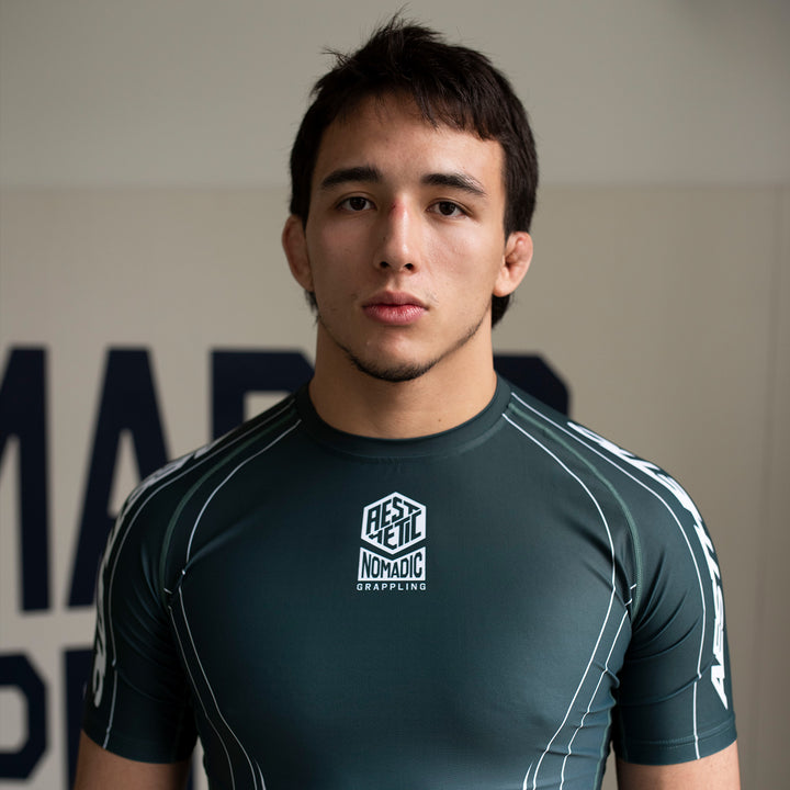 AESTHETIC Petrol Blue Jozef Chen Short Sleeve Rashguard - front view